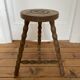 Tripod stool in solid wood, feet turned