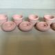 Four double pink candlesticks