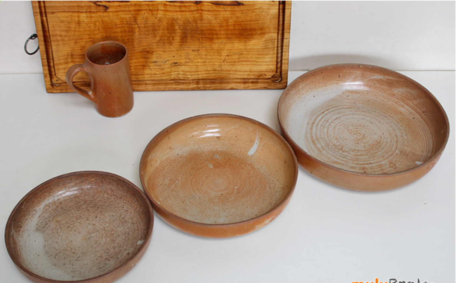 Set of trundle sandstone dishes