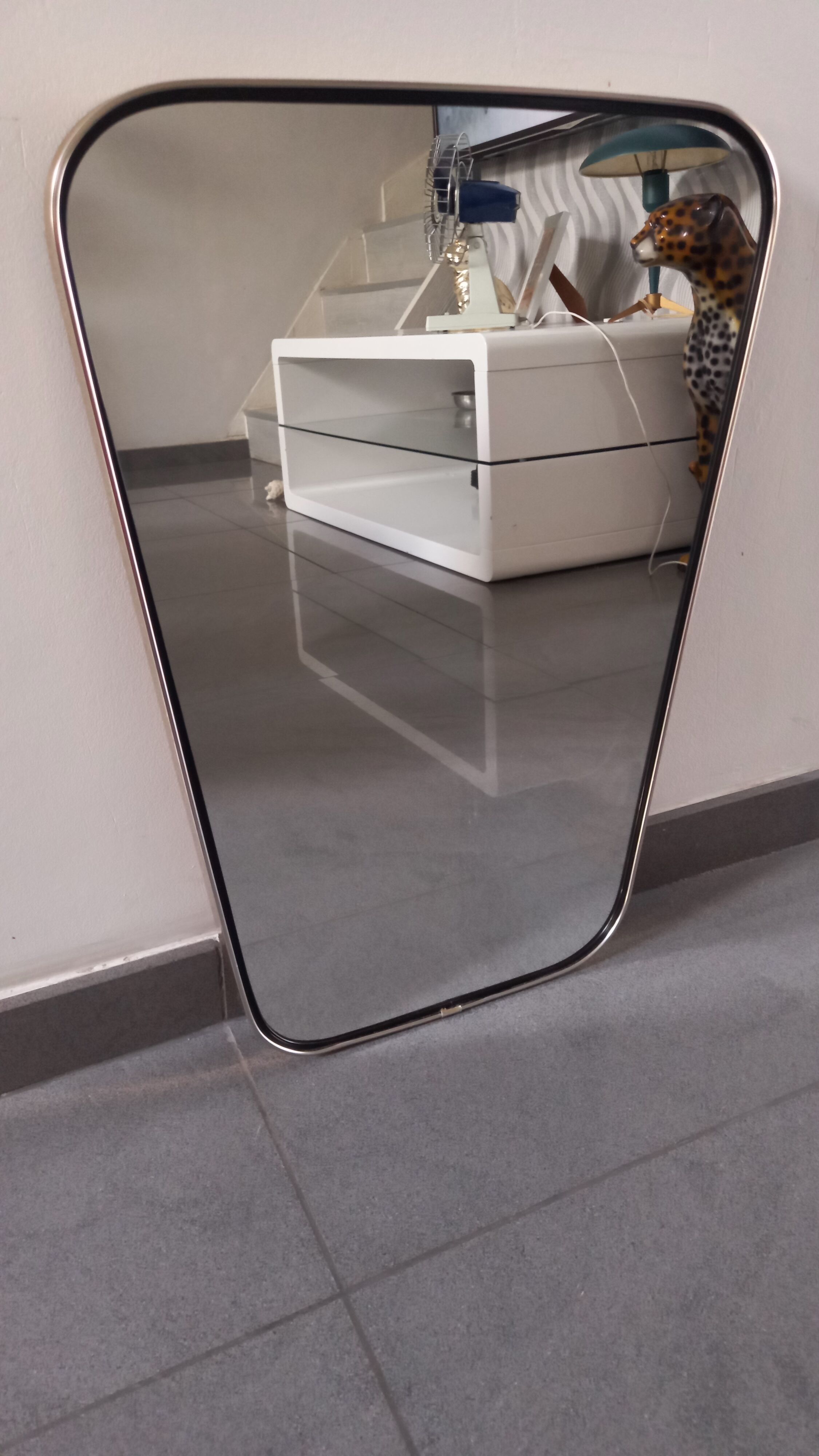 Asymmetric mirror