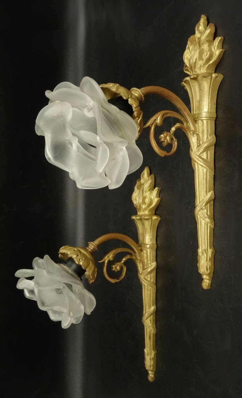 Pair of single-light wall sconces in the Louis XVI torch style - gilded bronze