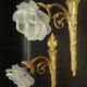 Pair of single-light wall sconces in the Louis XVI torch style - gilded bronze