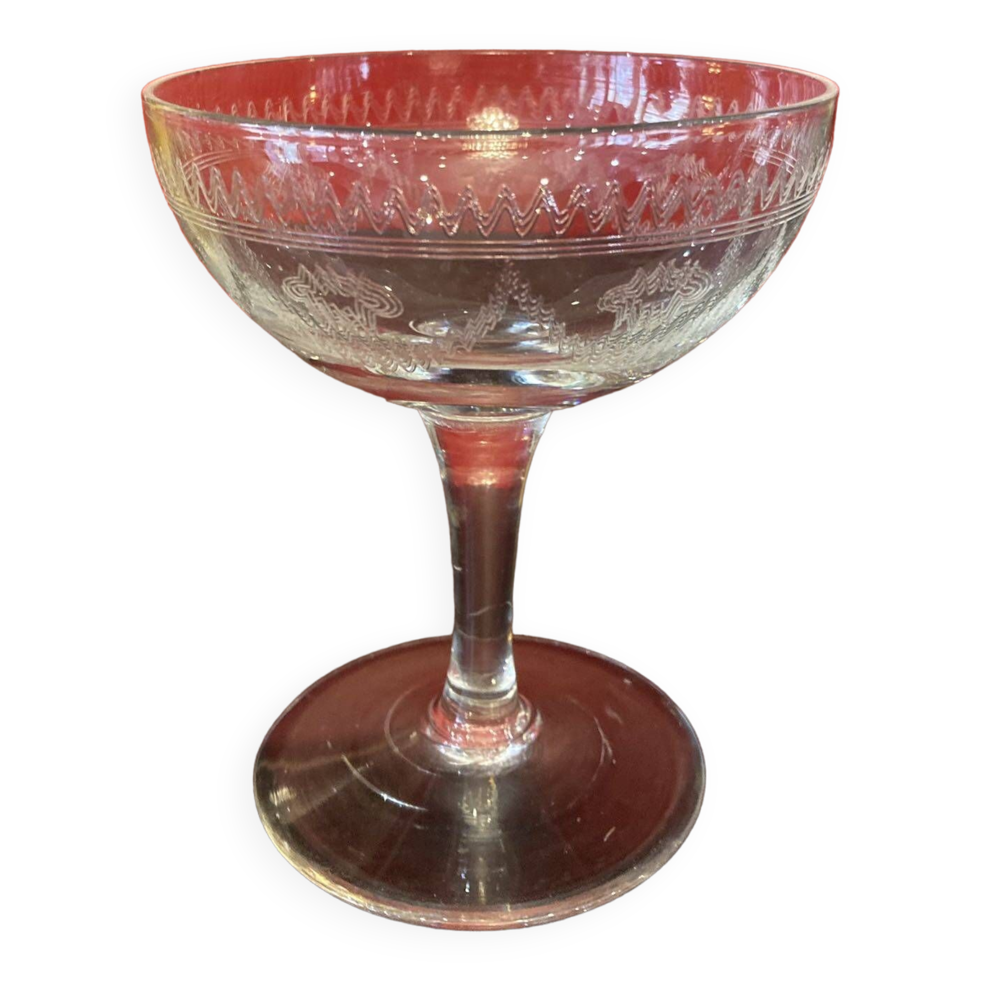 Early 20th century champagne glass burst by hand