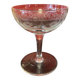 Early 20th century champagne glass burst by hand