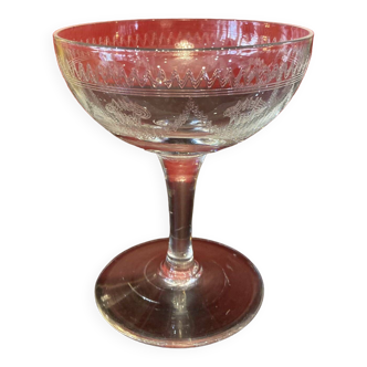 Early 20th century champagne glass burst by hand