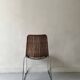 Chair made of rattan, wicker and chrome-plated metal