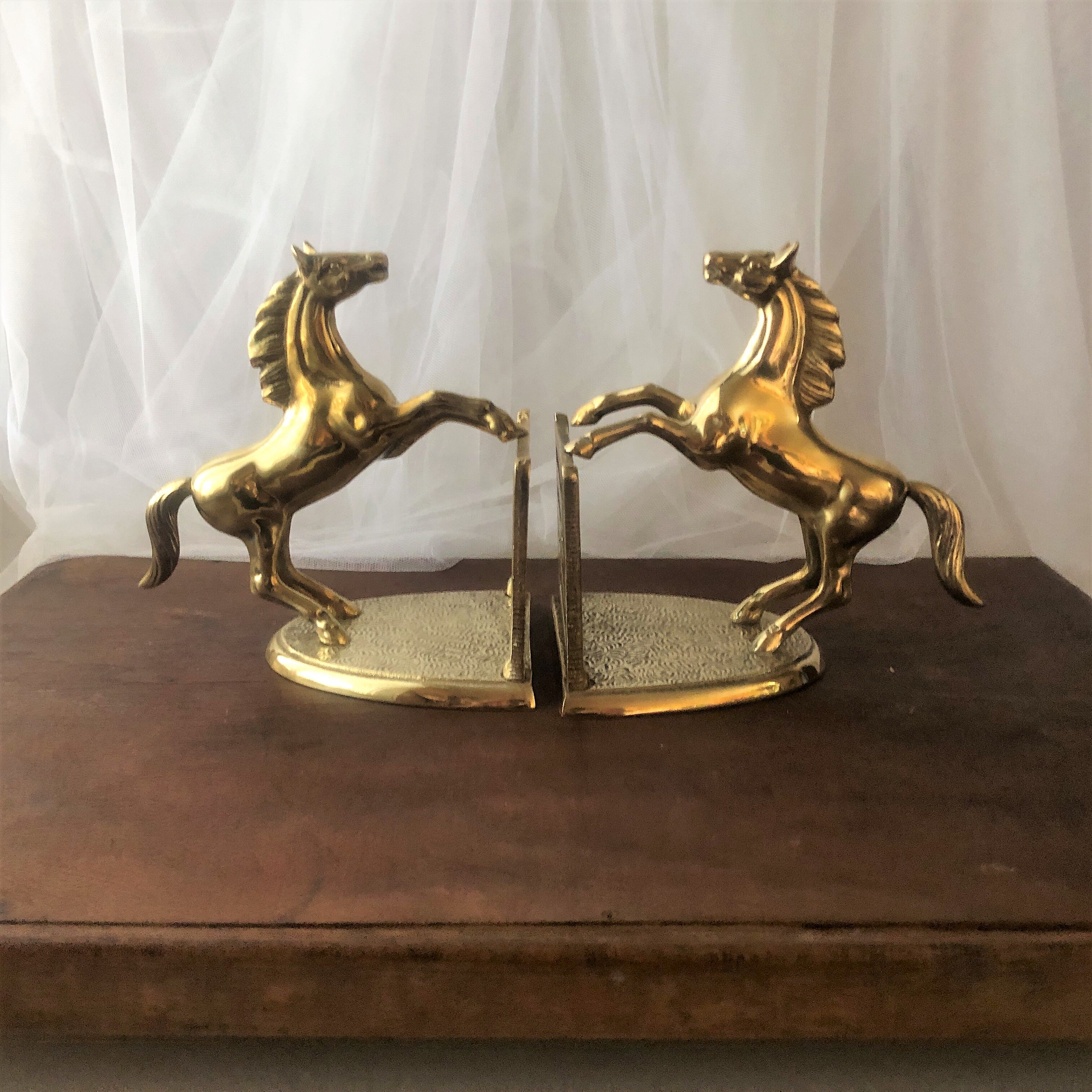 Goldeneye brass décor horses