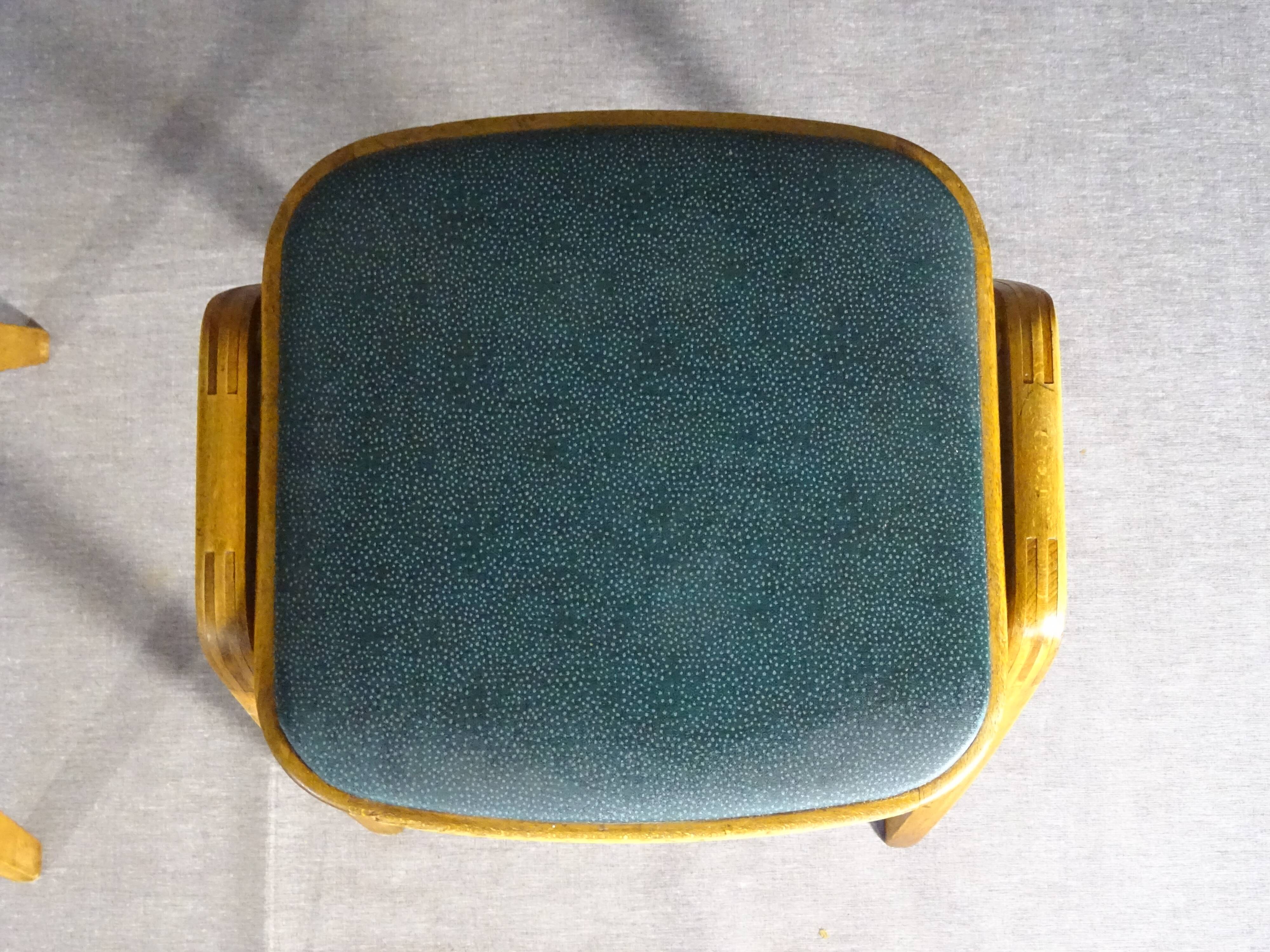 2 Mid-century green vinyl stools with compass legs from the 1960s.