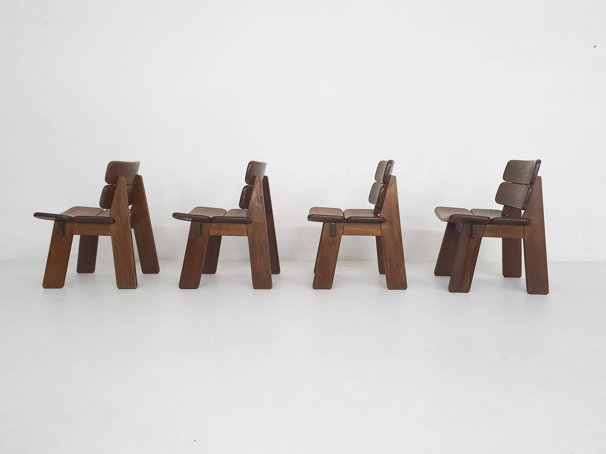Set of four solid oak dining chairs, The Netherlands 1970's