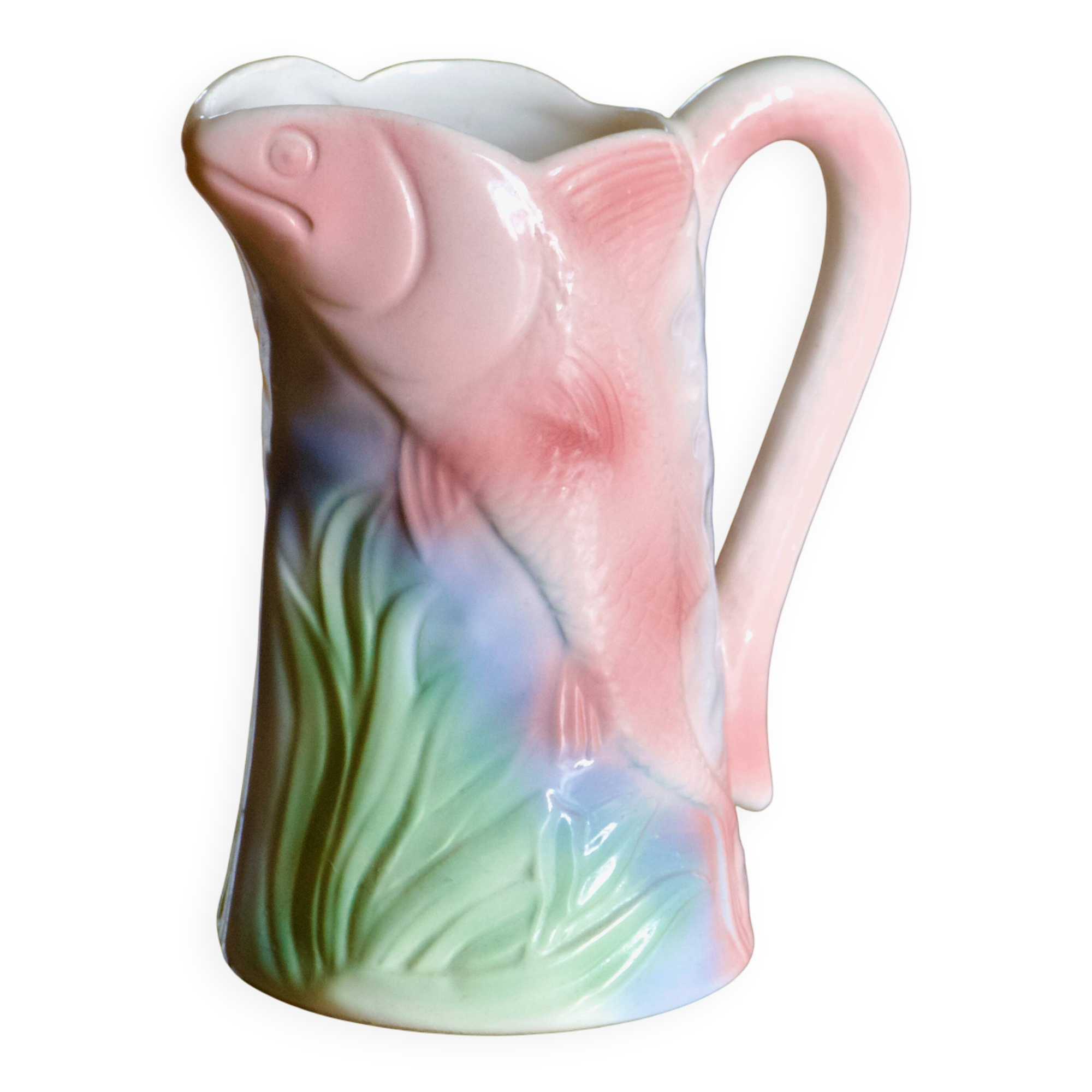 Vintage carafe in colorful fish slip