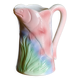 Vintage carafe in colorful fish slip