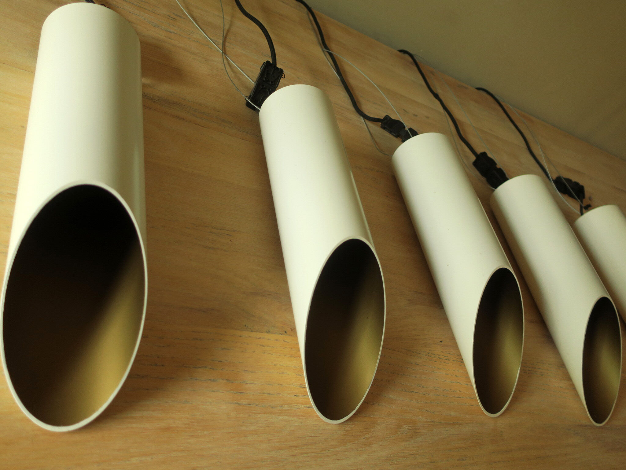 Set of 5 large cylindrical white and gold cinema pendants 1970s