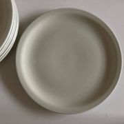 Set of 7 Scandinavian modernist flat plates in ivory earthenware