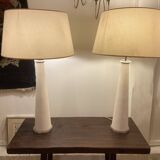 Pair of modernist stone and bronze lamps.