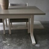 Dining table set and 4 dining chairs by Pierre Mennen for Pastoe.