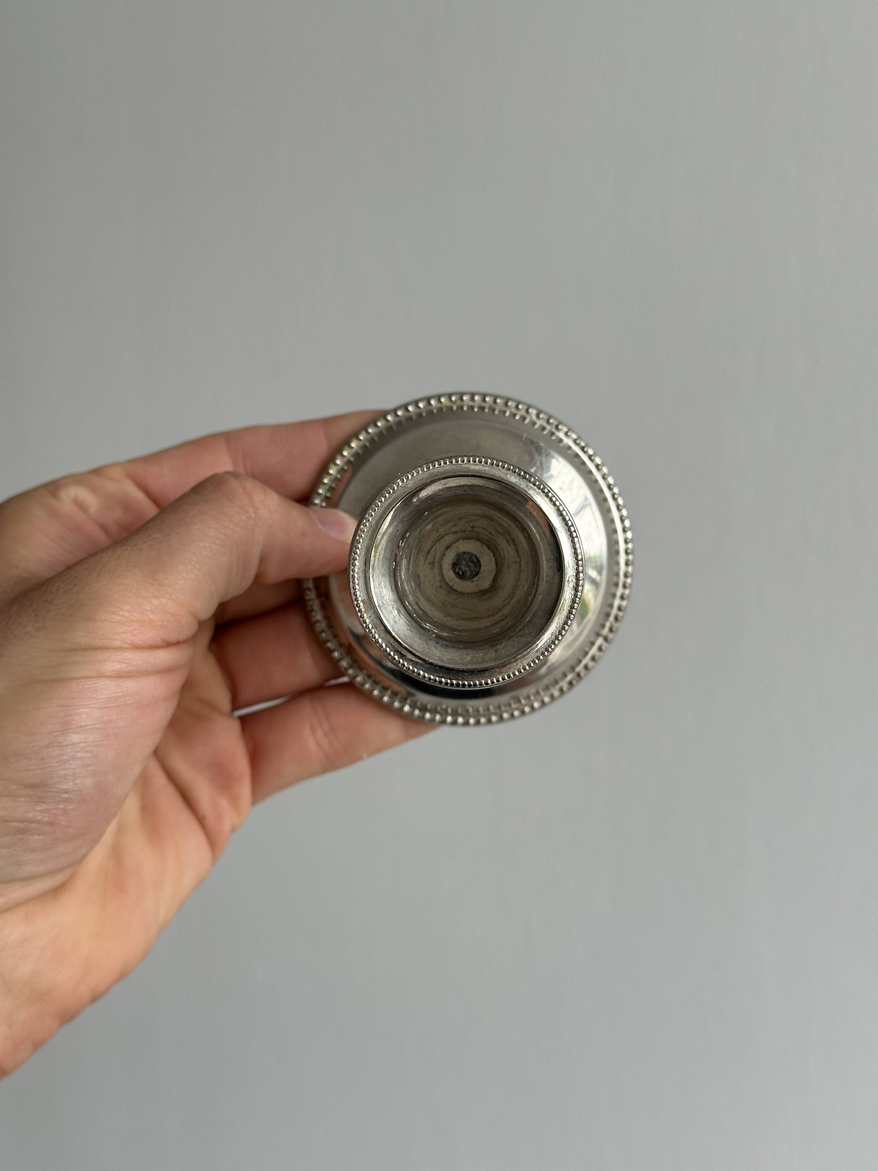 4 vintage metal candle holders