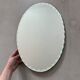 Old beveled oval mirror