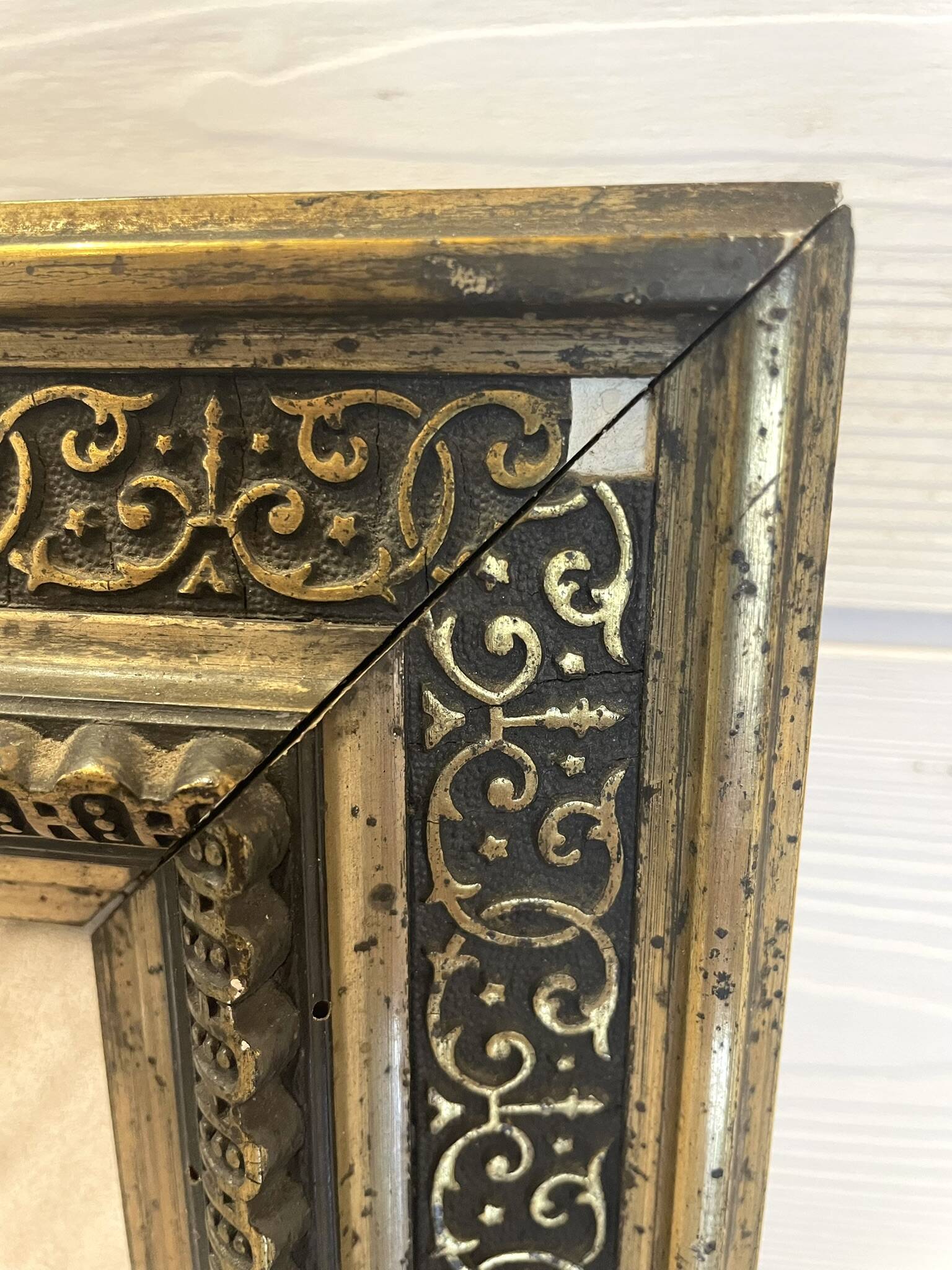 Large gilded antique mirror with moulding in the Napoléon III style.