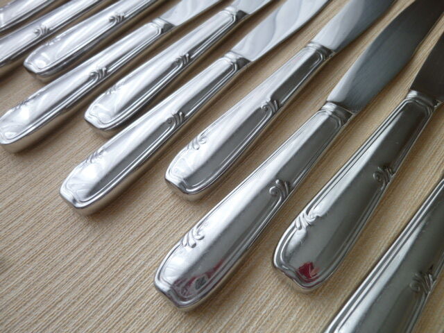 Box of 12 one-piece stainless steel table knives