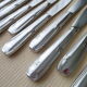 Box of 12 one-piece stainless steel table knives