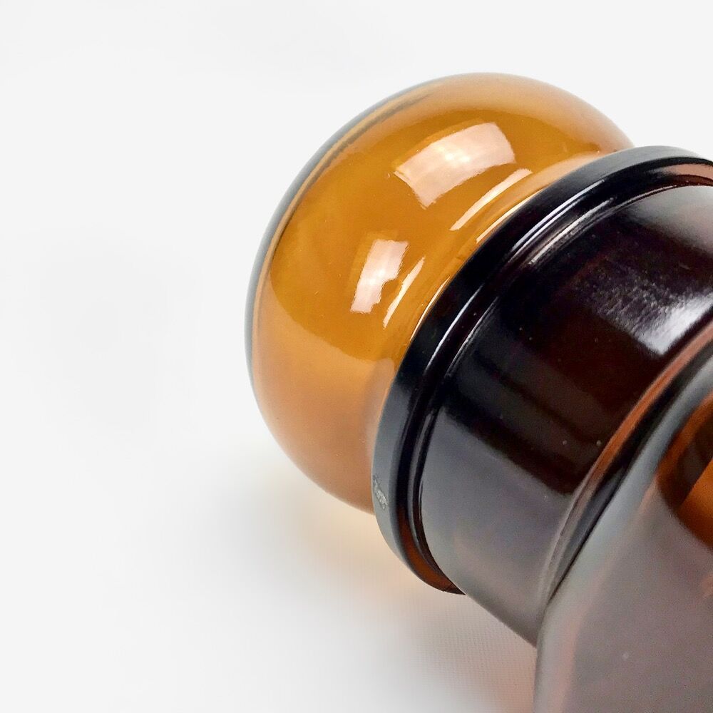 Pair of amber glass jars
