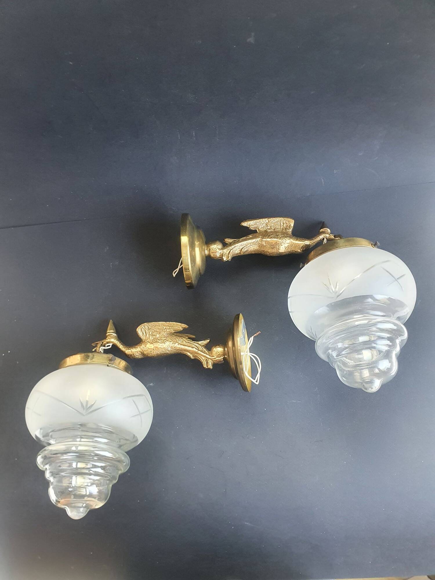 Pair of antique bronze wall sconces