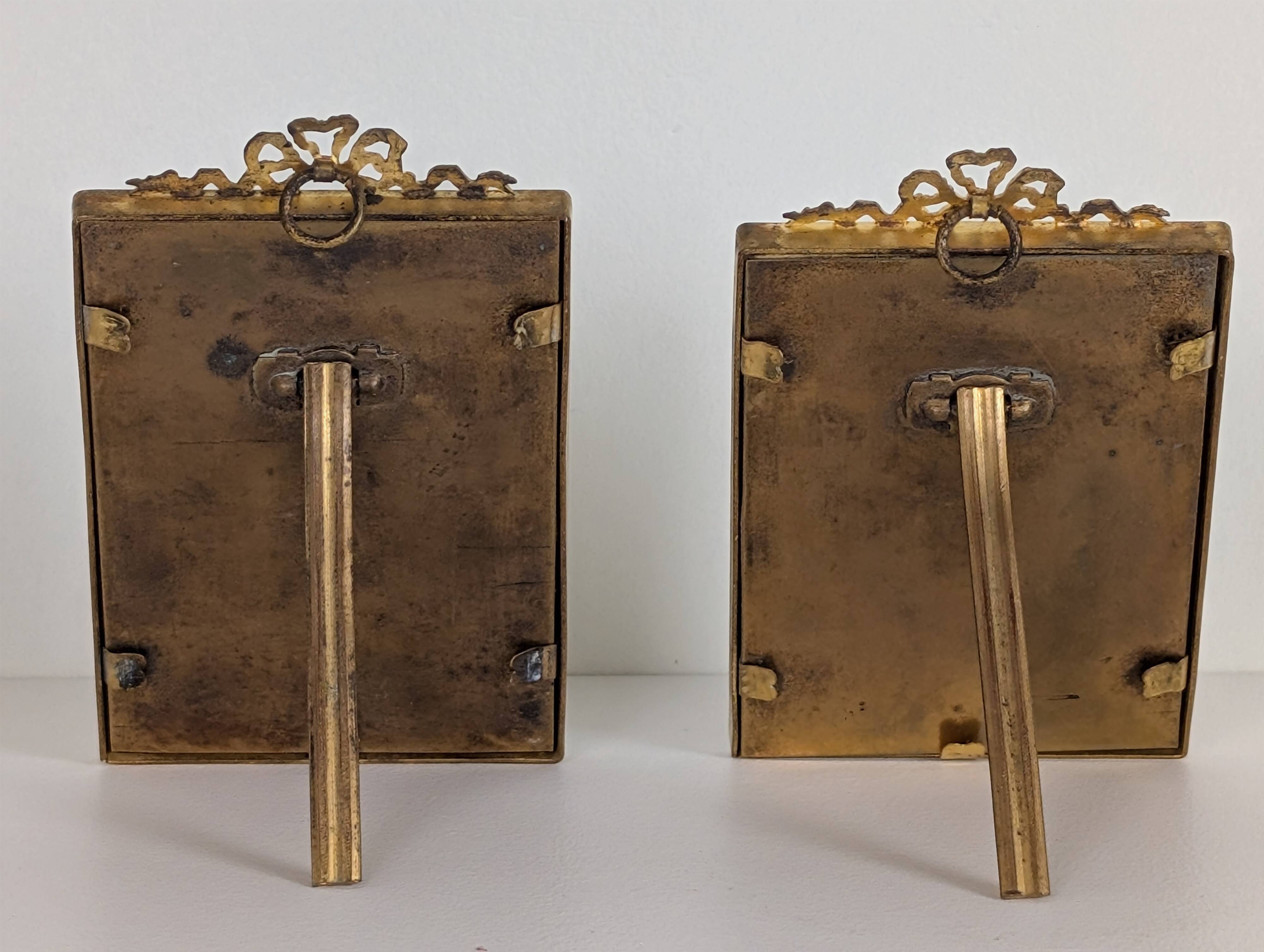Pair of gilt bronze photo frames