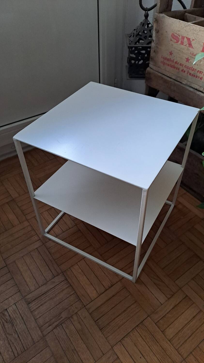 Metal coffee table with two levels.