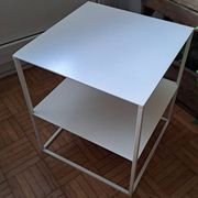 Metal coffee table with two levels.