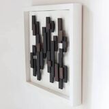 Three-dimensional framed artwork in wenge wood by Studio Aik