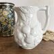 Jug in slipware with fruits