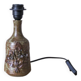 Sandstone lamp base decorated with flowers