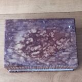 Tobacco set including a vintage stone ashtray.