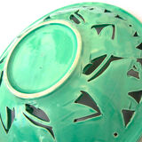 Openwork XL dish in green slurry like olive branches