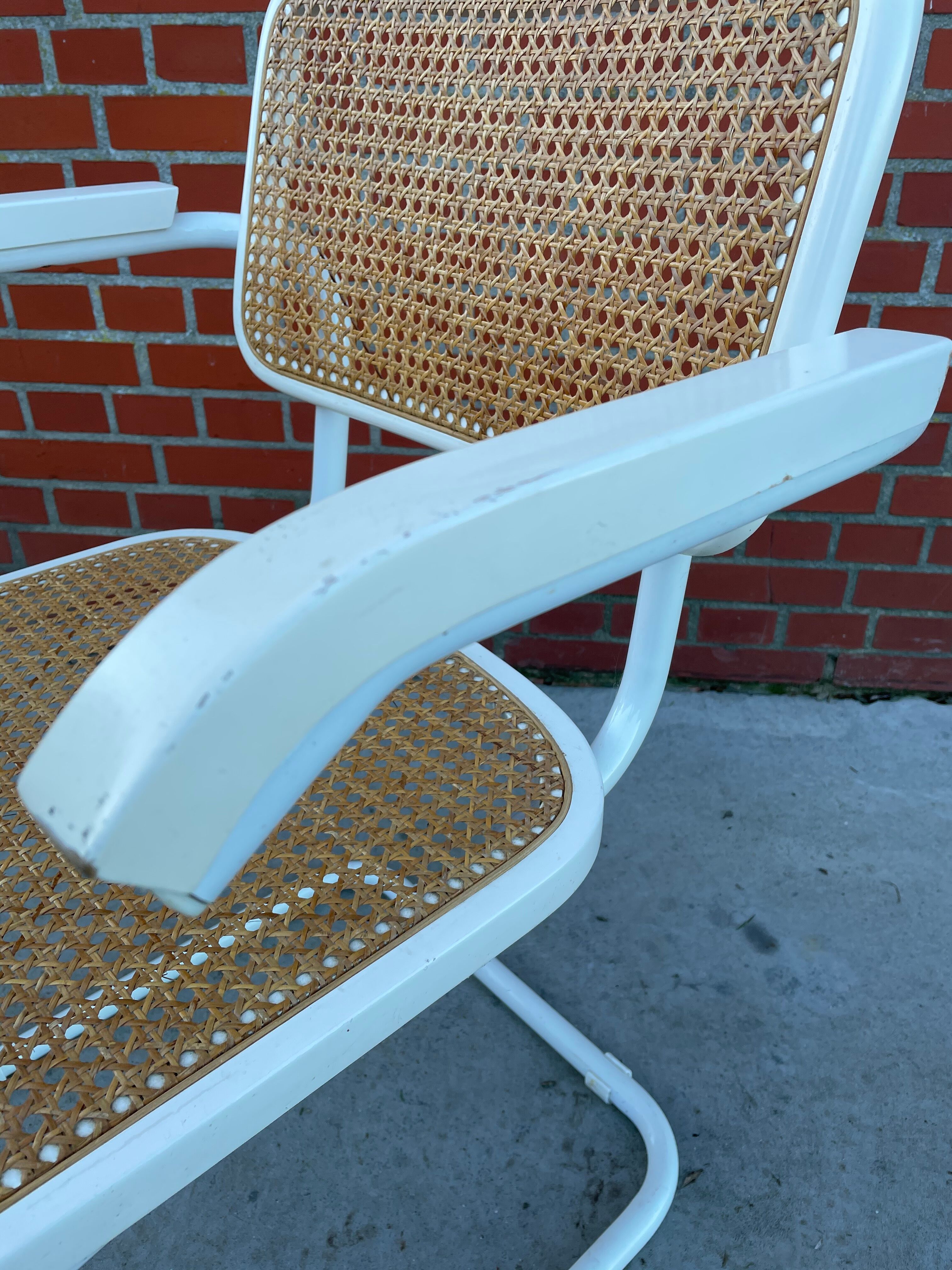 Cesca Chair model with armrest in white