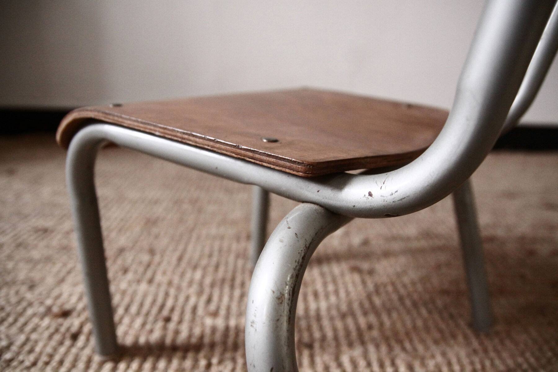 Old school chair in wood and metal