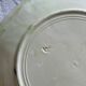 Lot of 4 Onnaing barbotine plates with grapevine design.