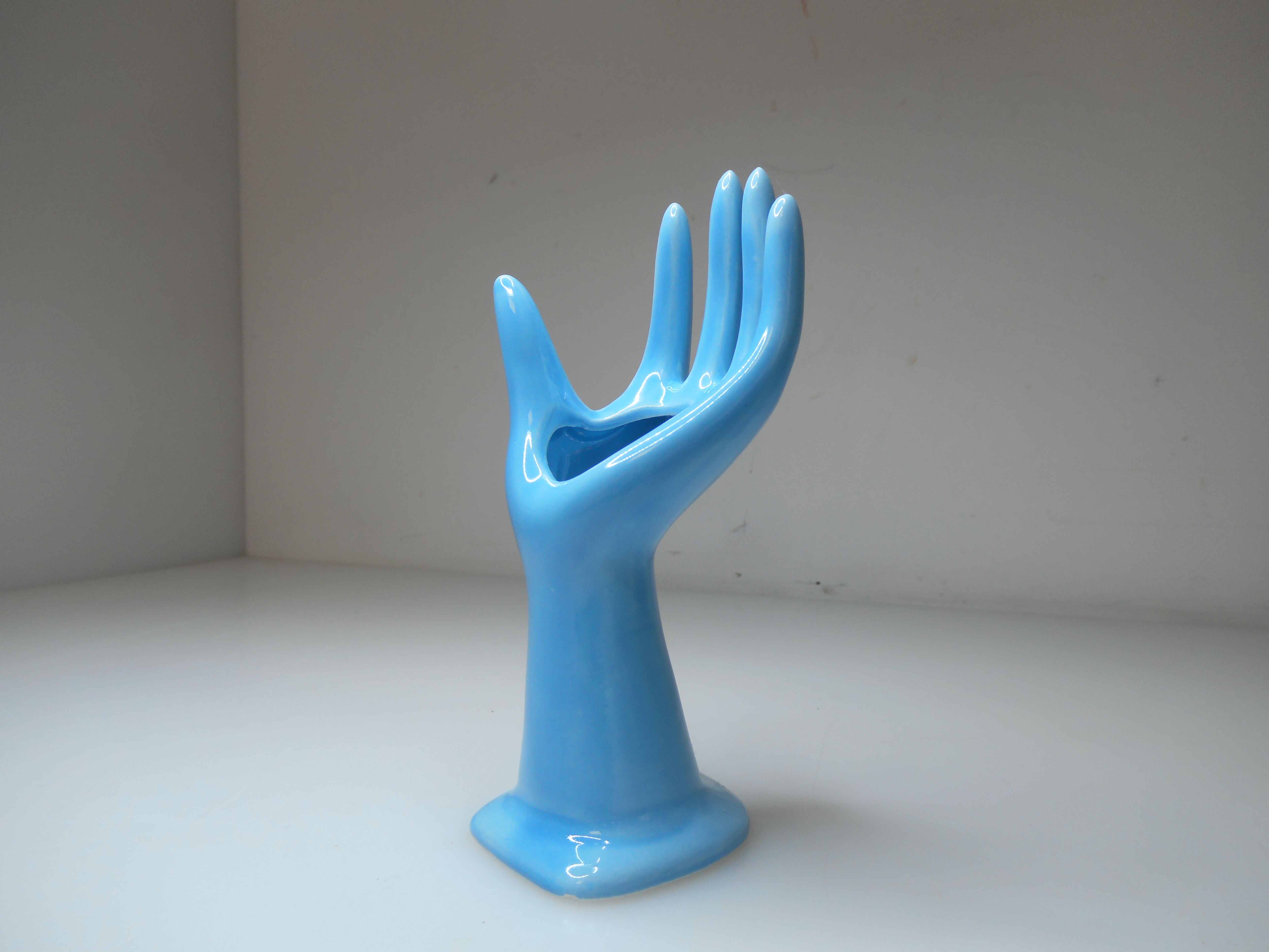 Vintage light blue ceramic hand