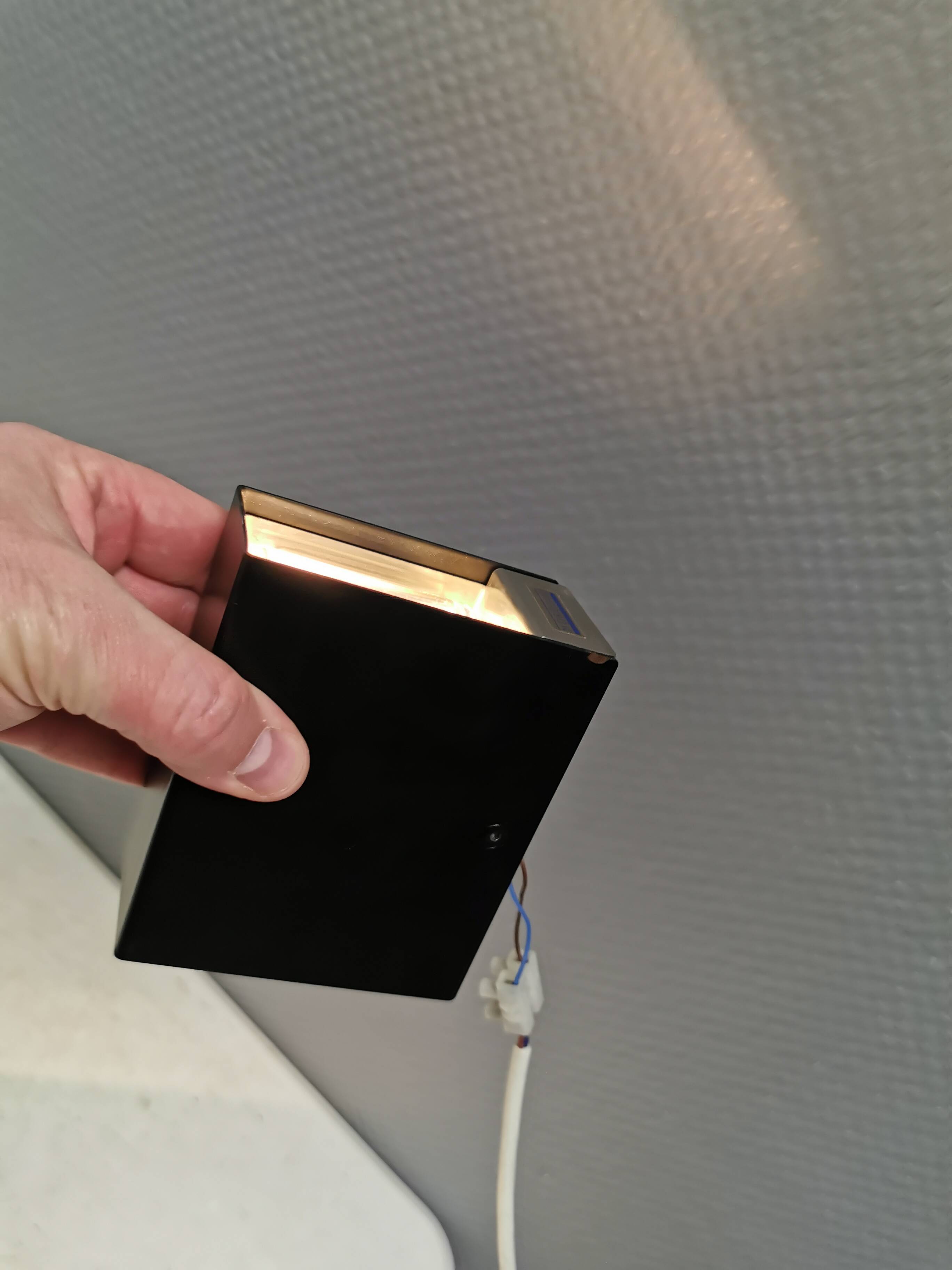 A beautiful up/down wall lamp, designed in Italy in the 1990s.