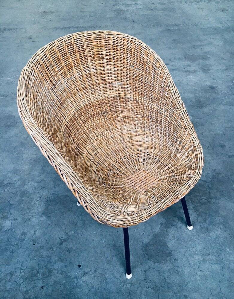 Wicker lounge chair in the style of Dirk Van Sliedregt for Rohé Noordwolde, Netherlands, 1960s.