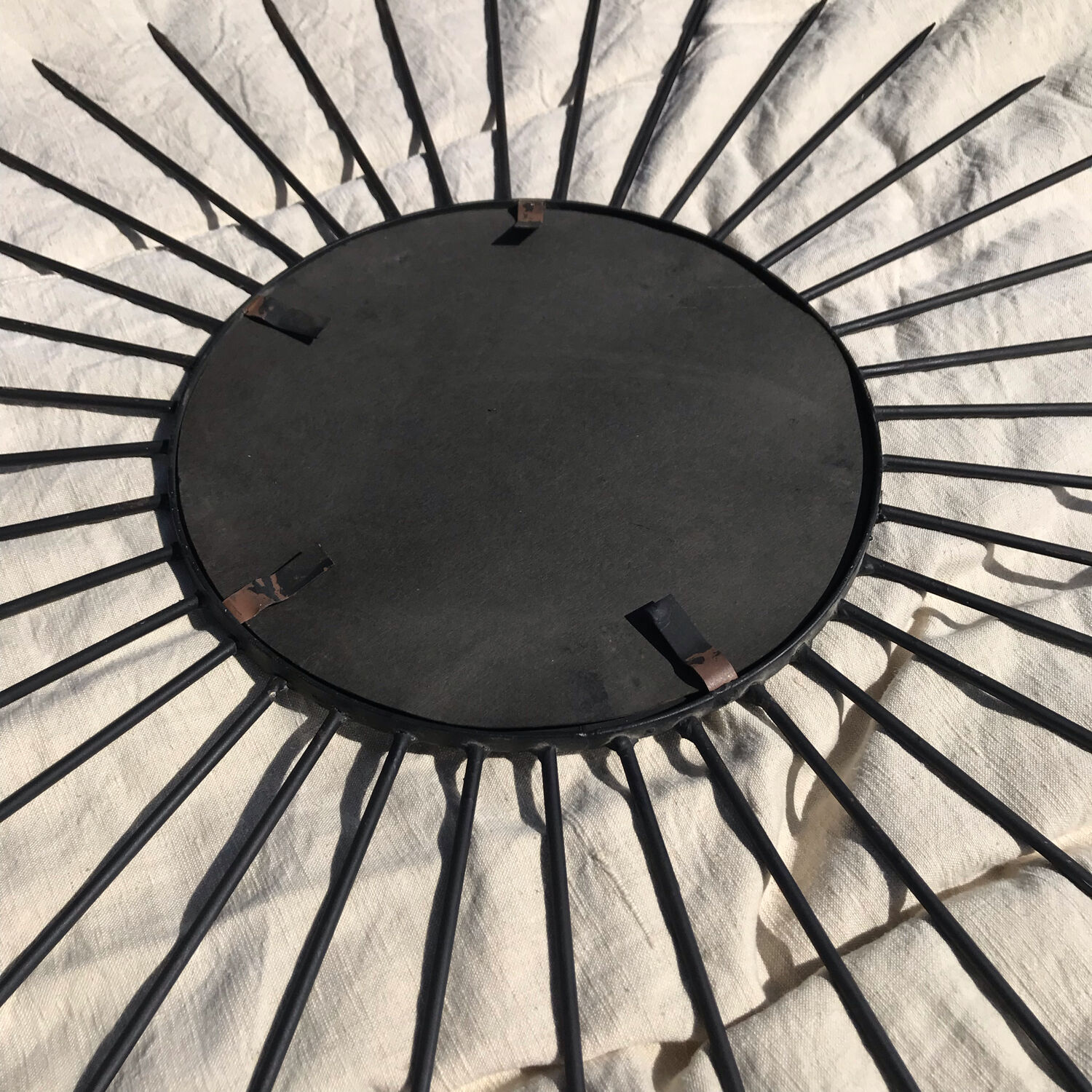 Vintage black metal sun mirror 1950