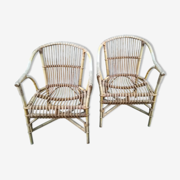 Pair of natural patinated rattan chairs