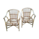 Paire de fauteuils en rotin patinés naturels