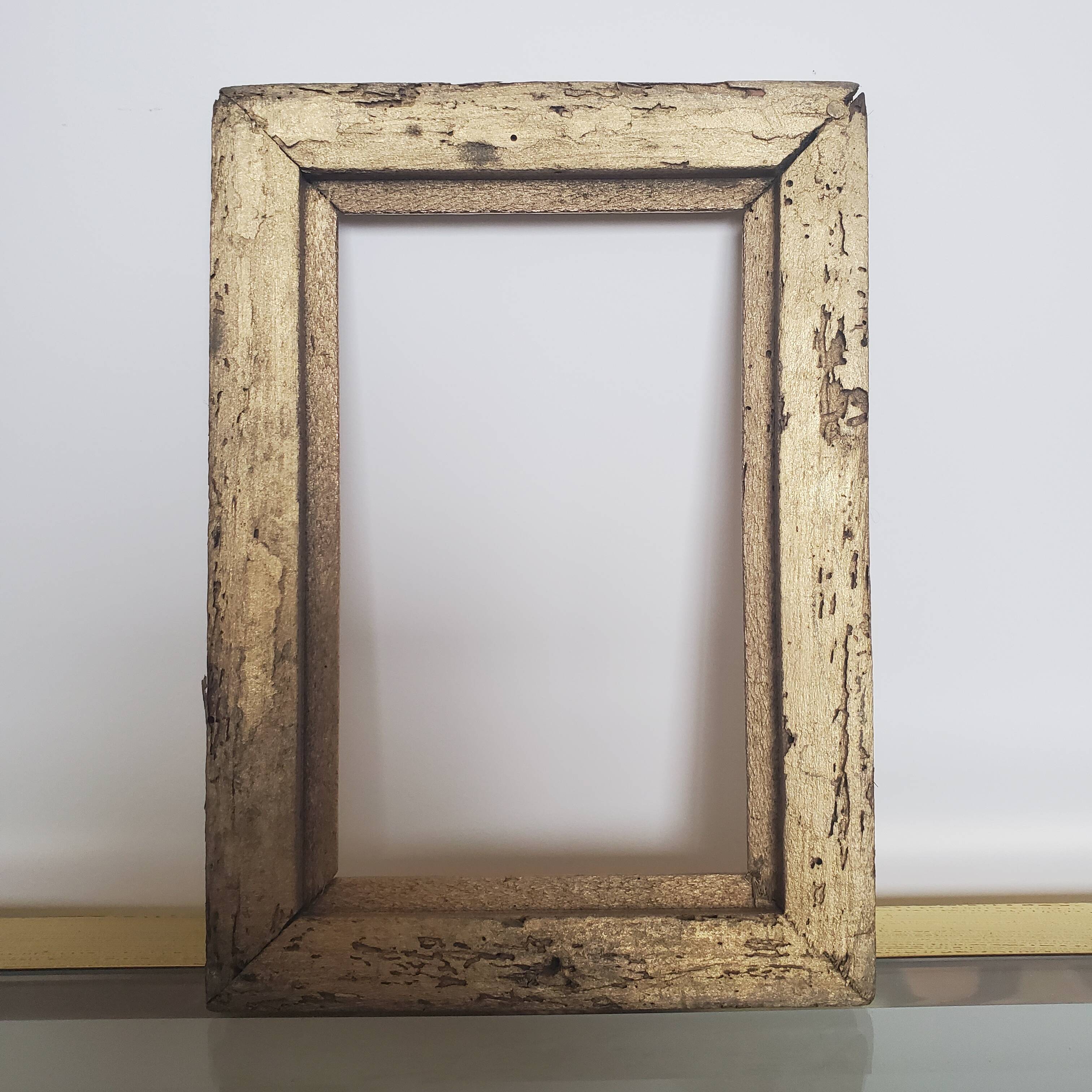 Small old gilded wooden frame