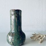 Old pitcher in glazed terracotta