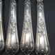12 silver metal table knives model Rocaille