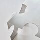 Puzzle - table basse sculpturale en acier inoxydable par Veliento
