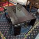 Vintage rosewood and smoked glass coffee table from the 1980s