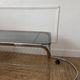Table basse en métal et verre fumé 1970