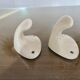 Pair of salmon-colored art deco porcelain hooks from the 30s and 40s